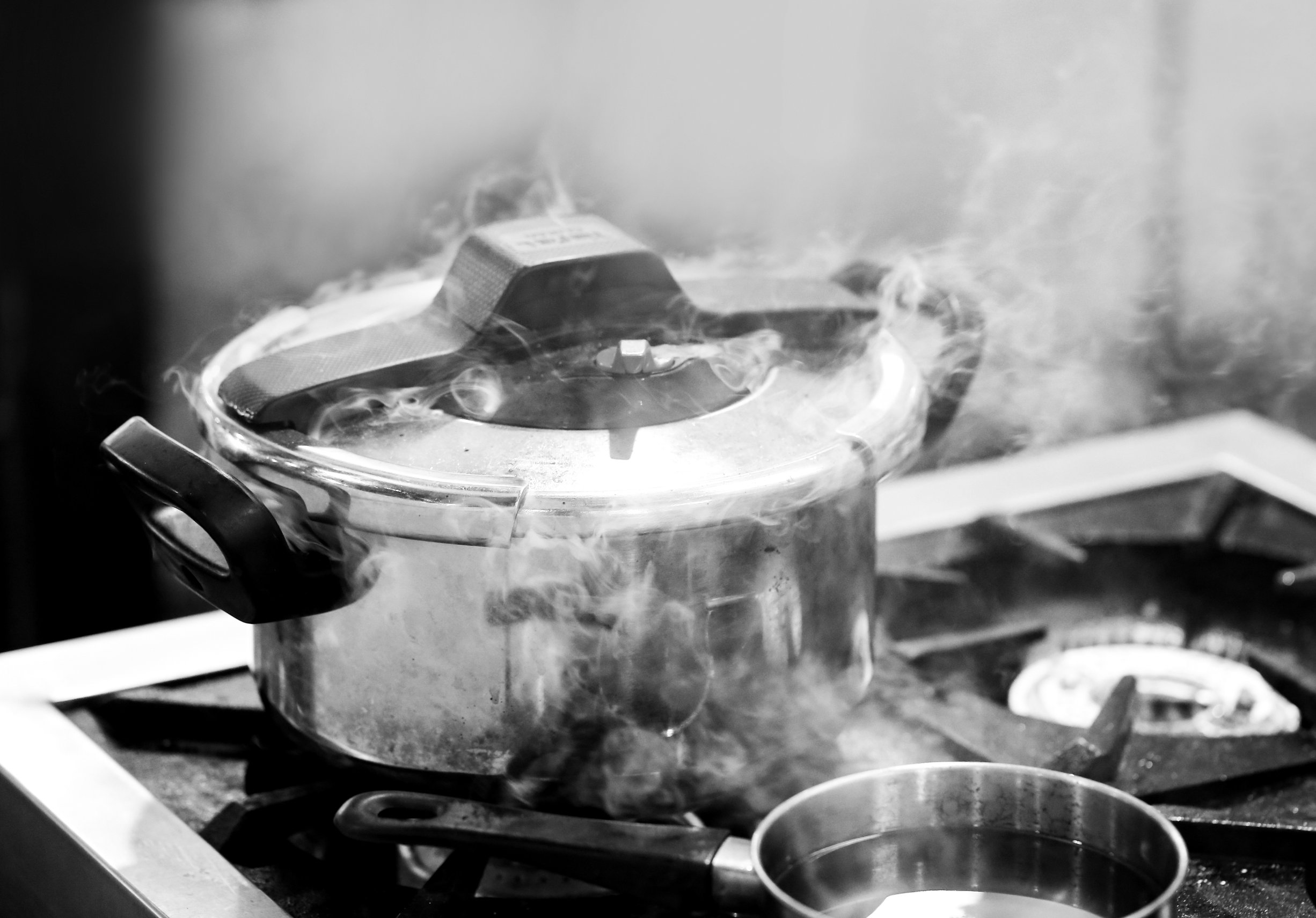 Pressure cooker steam over cooking in a Kitchen